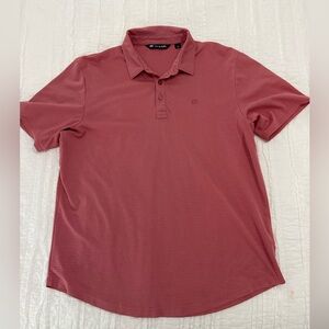Travis Mathew Men's Polo Shirt in coral